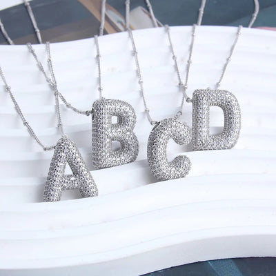 Bubble letter initial necklace set | Golden Blanco (7/9)