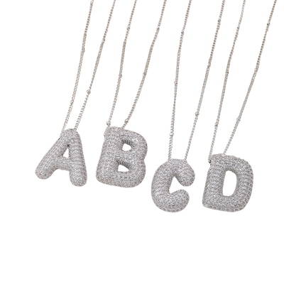 Bubble letter initial necklace set | Golden Blanco (1/9)